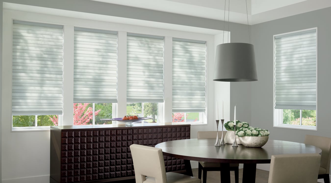 Cordless motorized shades in a Bluff City dining room